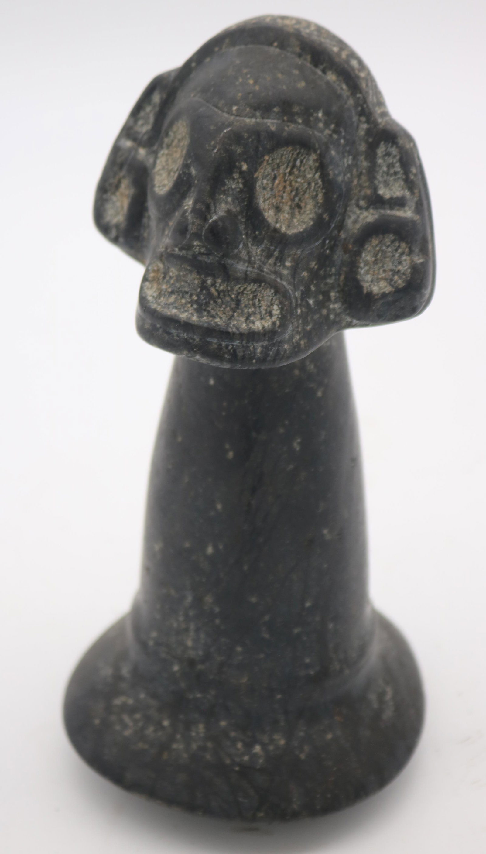 TAINO. PRE-COLUMBIAN ANTHROPOMORPHIC COHOBA: PESTLE USED TO CRUSH THE HALLUCINOGENIC SEEDS OF THE COHOBA TREE. THE EXTREMELY LARGE HEAD SYMBOLIZES THE HEAD AS THE CENTER OF THE EXPANSIVE MIND. EYE AND MOUTH SURROUNDS AS WELL AS A WELL DEFINED HE