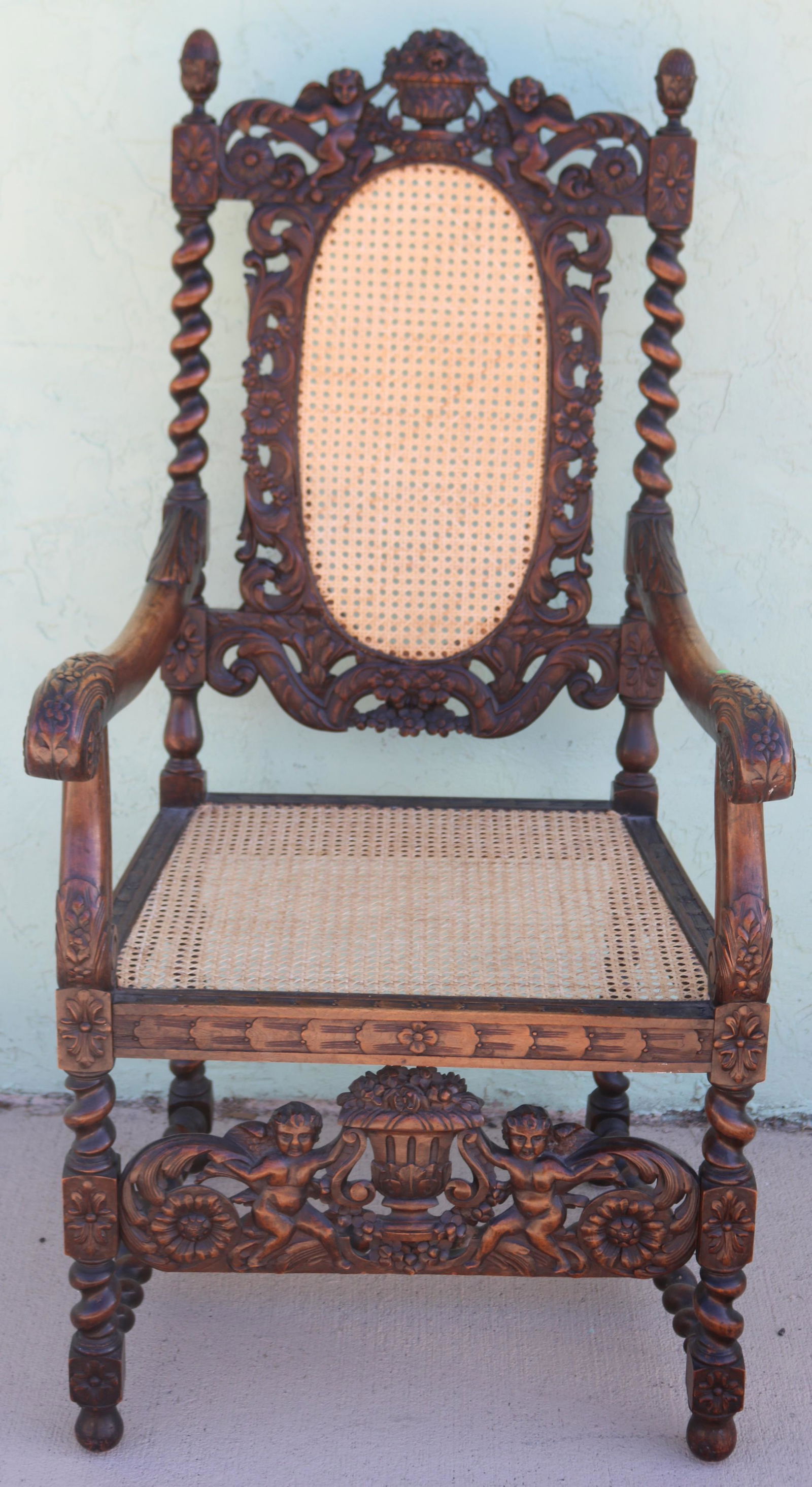 ORNATELY CARVED OAK EARLY 20TH C. CHAIR, BY: KARPEN FURNITURE, CANED SEAT & BACK, ORIGINAL FINISH, CARVED FIGURES, 50" H, 25" W, 24" D, 19" SEAT HEIGHT