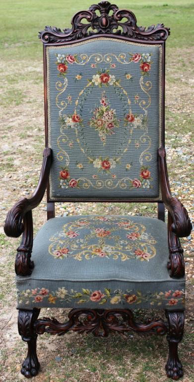 ORNATELY CARVED HIGH BACK ARMCHAIR,: LATE 19TH C. CLAW FEET, CARVED ARMS, NEEDLEPOINT BACK & SEAT, 54" H, 25" W, 26" D