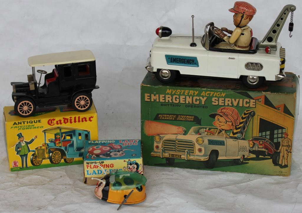 3 FRICTION TOY CARS IN ORIGINAL BOXES,: WRECKER, OLD CADILLAC, AND FLAPPING LADYBUG, 4" - 10"