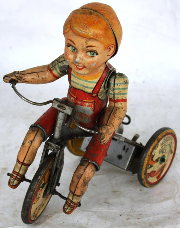 LITHO TIN TOY, KITTY CYCLIST BY UNIQUE ART,: WORN FINISH, 8 3/4"