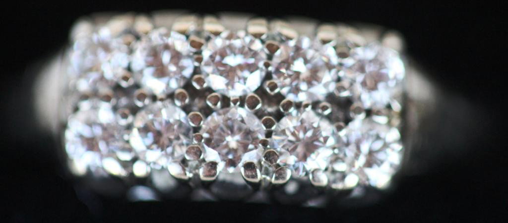 14K WHITE GOLD LADIES DIAMOND RING,: WITH TEN DIAMONDS, EACH APPROX. .15 - .2 CARATS, TOTAL CARAT SIZE APPROX. 1.5 - 2.0, TOTAL WEIGHT 3.5 GRAMS, RING SIZE 7+