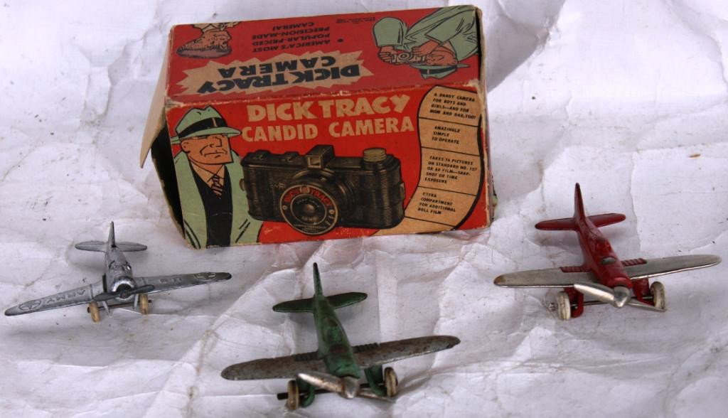LOT OF 4 TOYS TO INCLUDE DICK TRACY CAMERA: IN ORIGINAL BOX, 2 HUBLEY CAST IRON PLANES, AND AN AS IS BARCLAY PLANE