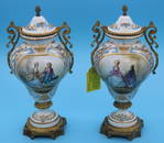 PAIR OF SEVRES PORCELAIN PORTRAIT COVERED URNS