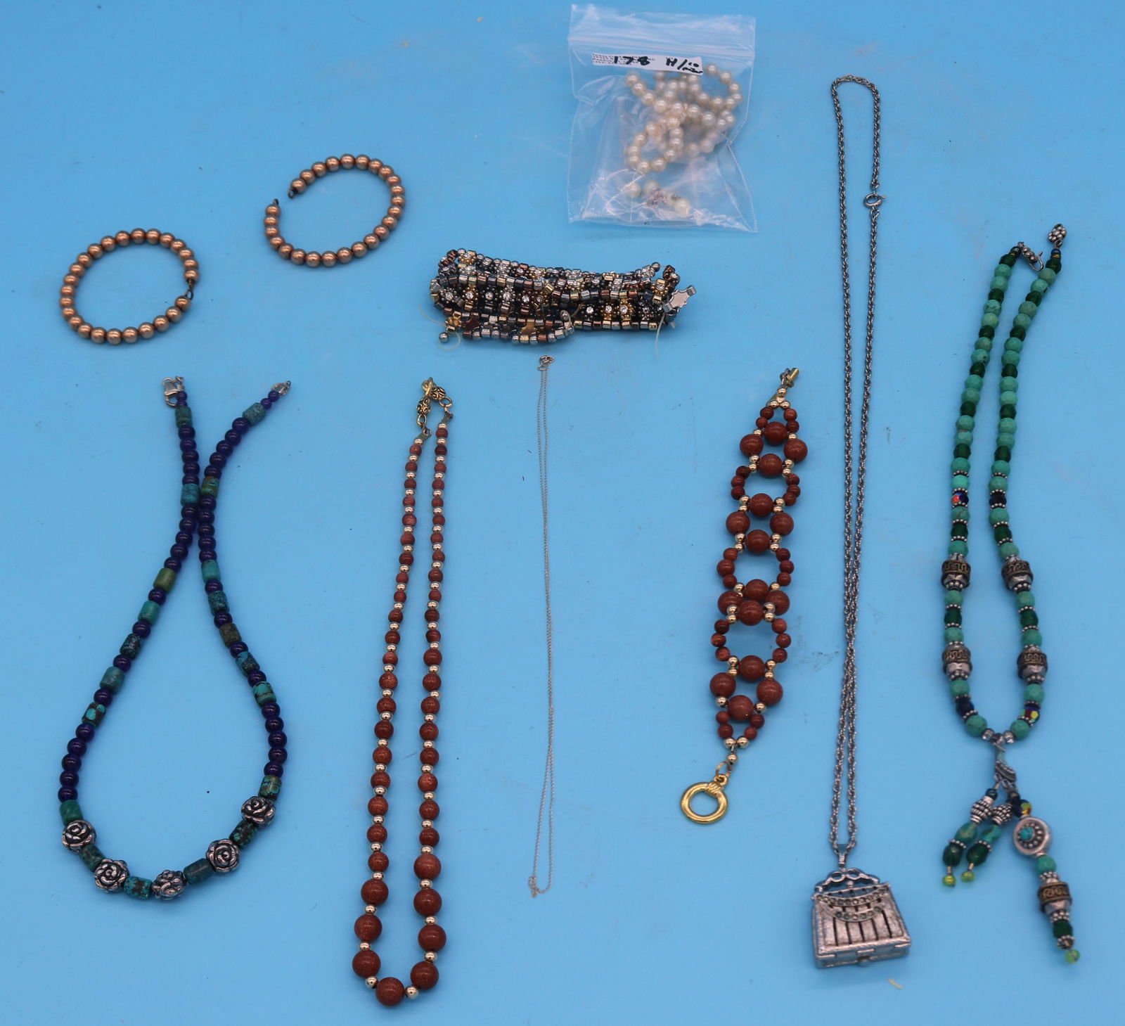 10 PCS. COSTUME JEWELRY, TINK 10K NECKLACE, 2: GOLD FILLED BALL BANGLE BRACELETS, 2 BEADED NECKLACE WITH SILVER, GOLD STONE NECKLACE & BRACELET, NECKLACE WITH PURSE WATCH PENDANT, STRAND FAUX PEARL NECKLACE & EARRING, BROKEN BRACELET