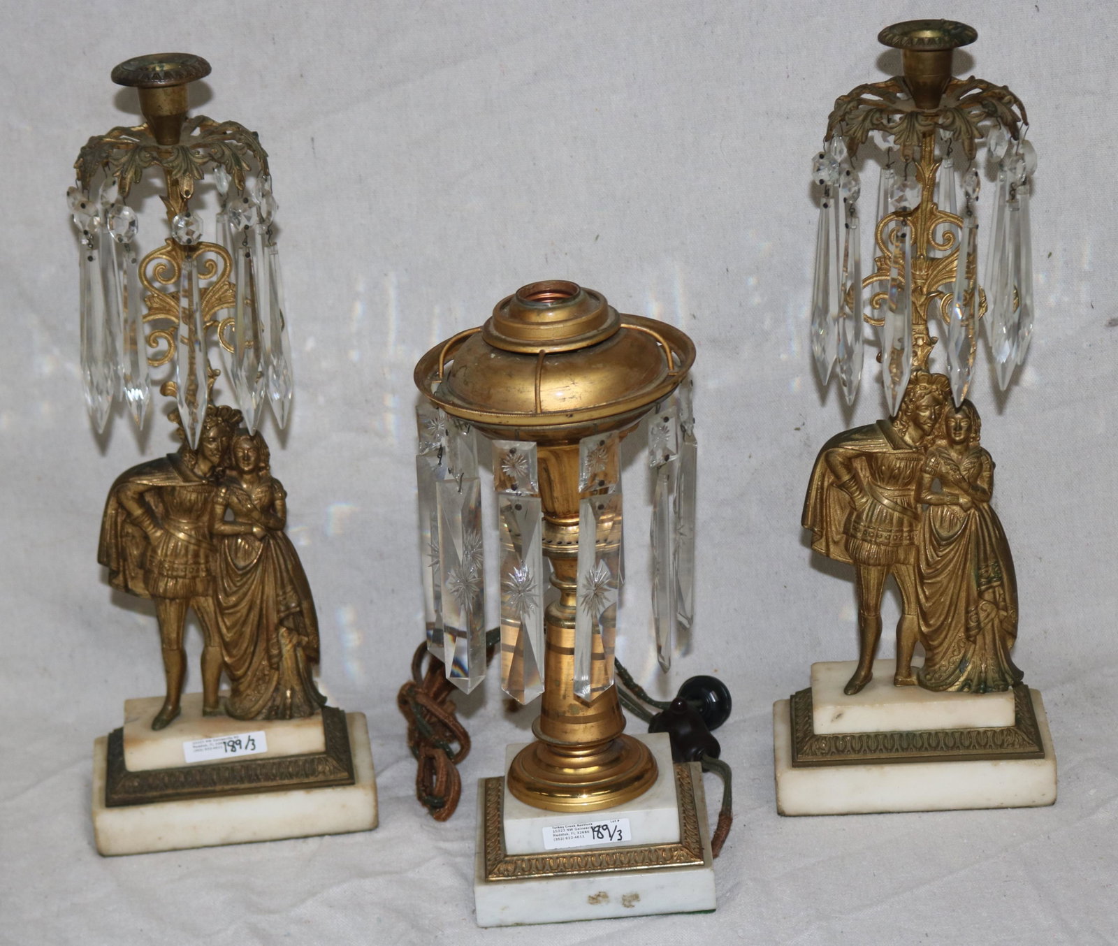 THREE PCS. 19TH C. LIGHTING, PAIR FIGURAL CANDLE: STICKS, GILT BRONZE STEPPED MARBLE BASE, 17" H, 6" W, GILT BRONZE ASTRAL LAMP, ELECTRIFIED STEP MARBLE BASE, 1 PRISMS MISSING, 12 1/2" H