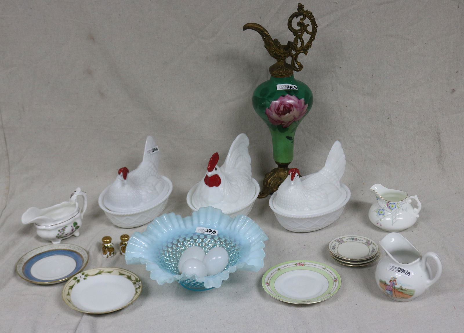 19 PC. LOT, GLASS & CHINA, 3 MILK GLASS HEN ON: NEST, 3 GLASS EGGS, BLUE OPALESCENT BOWL, LARGE EWER, 3 CREAMERS, 6 SMALL PLATES, SALT & PEPPER, 1 3/4" - 17" H