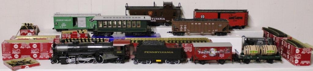 CONTEMPORARY LARGE SCALE TRAIN SET,: BY LEHMANN-GROSS-BAHN, INCLUDES ENGINE, TENDER, 7 CARS, TRANSFORMER, AND TRACK, IN LIKE NEW CONDITION