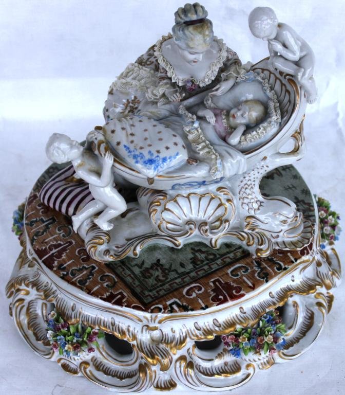 19TH C. PORCELAIN FIGURAL GROUP,: MOTHER WITH CHILD IN CRADLE, VERY SLIGHT LOSS TO LACE, 8 1/2 H, 9" DIA."