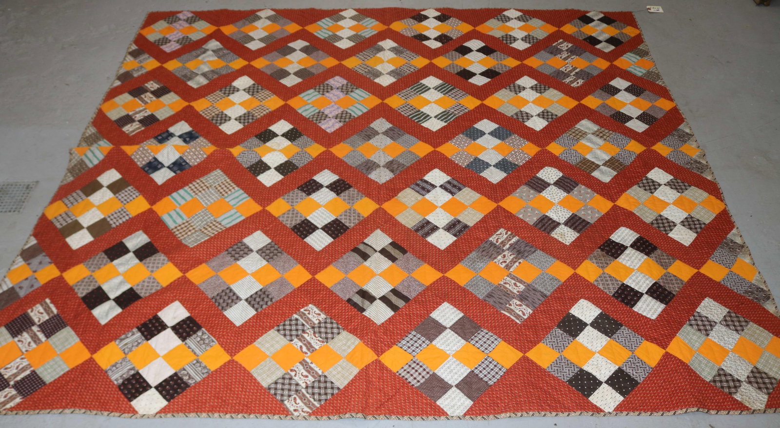 EARLY 20TH C. HANDMADE QUILT, MULTICOLOR,: GEOMETRIC DESIGN, 5' 10" X 6' 6", SIGNED