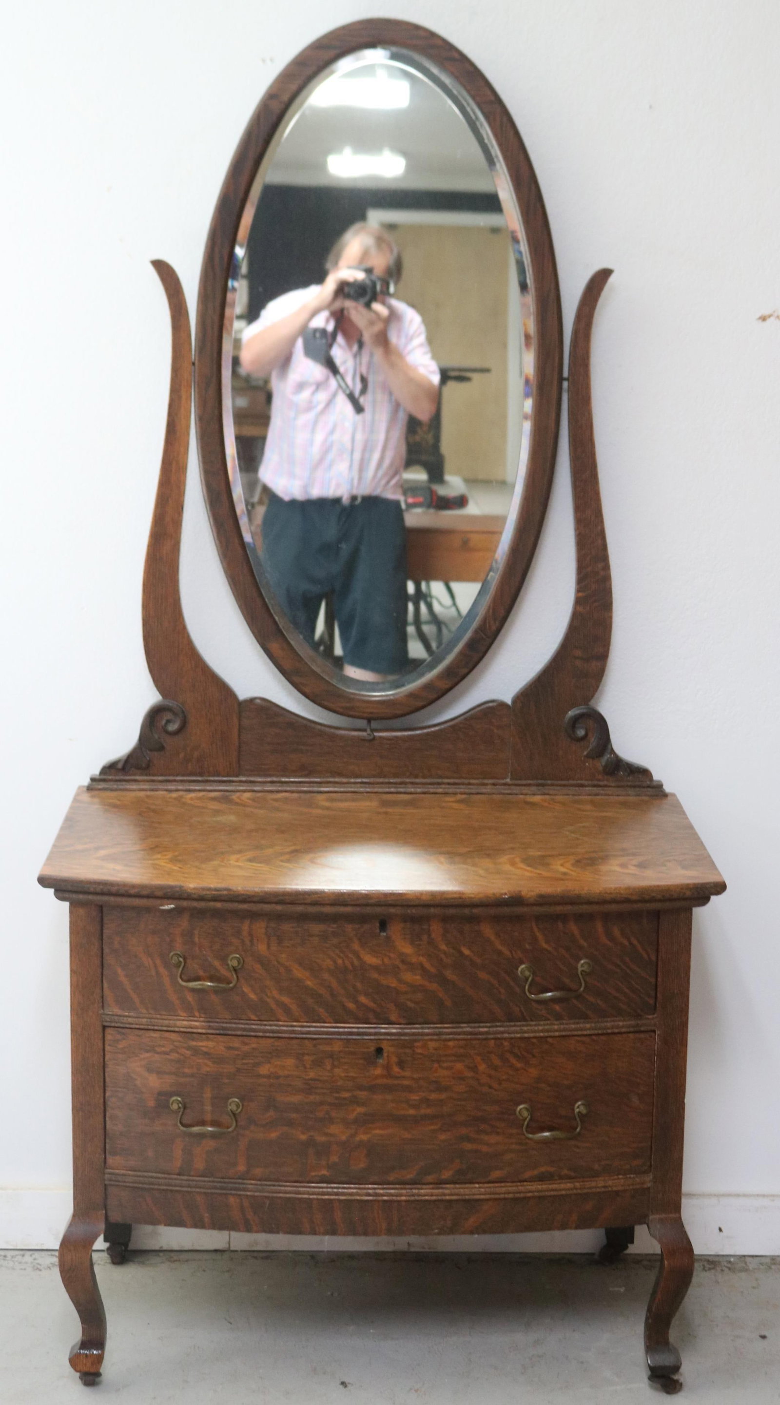 REFINISHED OAK PRINCES DRESSER, LARGE OVAL: BEVELED MIRROR, 2 DRAWER BASE, MISSING SMALL PIECE TO FOOT, OLD BRASSES, 71" H, 33" W, 20 1/2" D, BOW FRONT
