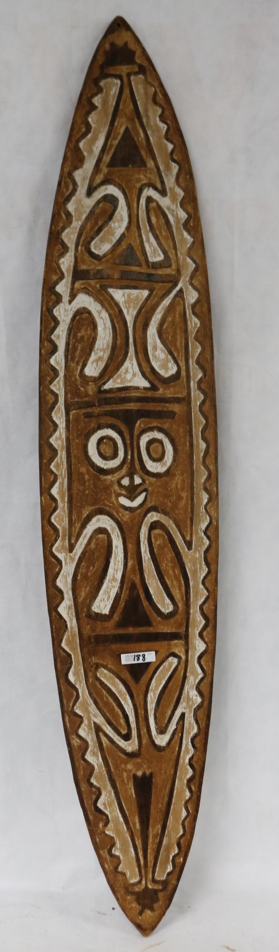 PAPUA NEW GUINEA CARVED & POLYCHROME PAINTED: SHIELD, STYLIZED FACE DESIGN, 47" H, 9 1/4" W