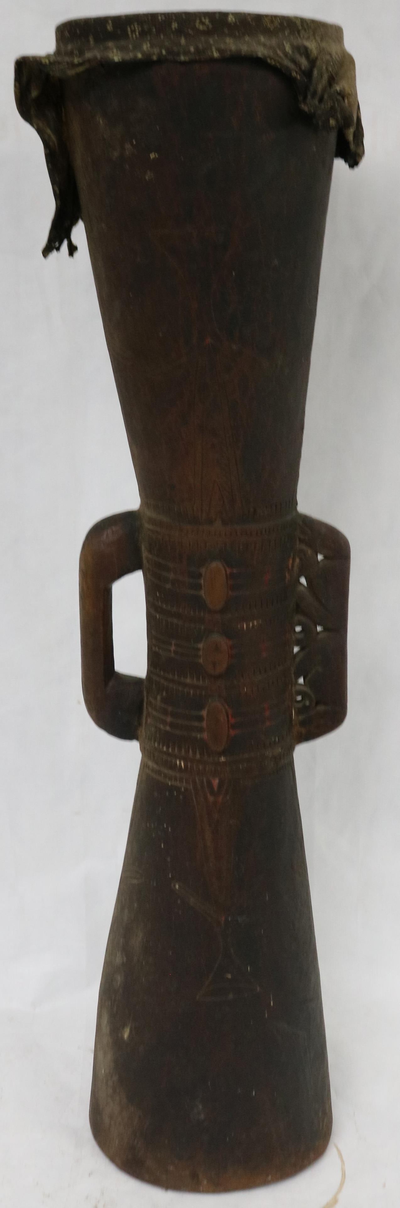PAPUA NEW GUINEA CARVED DRUM, CARVED ANIMAL: HANDLE, GEOMETRIC CARVED & INCISED DESIGN, LIZARD SKIN HEAD, 30 1/2" H, 8" W