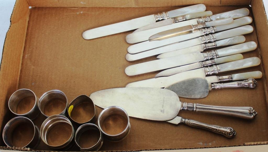LOT TO INCLUDE STERLING & MOTHER OF PEARL: HANDLED KNIVES, AND 7 MISC. NAPKIN RINGS, SOME SILVER