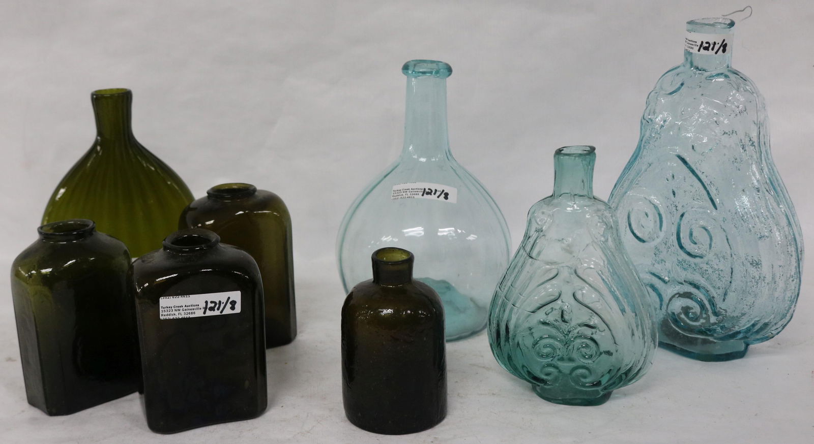 8 EARLY BOTTLES, 6" SCROLL FLASK OPEN PONTIL, 8: 3/4" SCROLL FLASK GRAPHITE PONTIL, (3) 4 1/4" OLIVE SNUFF BOTTLES OPEN PONTILS, BLOWN MOLD OLIVE BOTTLE 4" H OPEN PONTIL, AUGA MIDWEST FLASK, OPEN PONTIL, 7 1/2" H 20TH C. BLOWN OLIVE FLASK OPEN PONTI