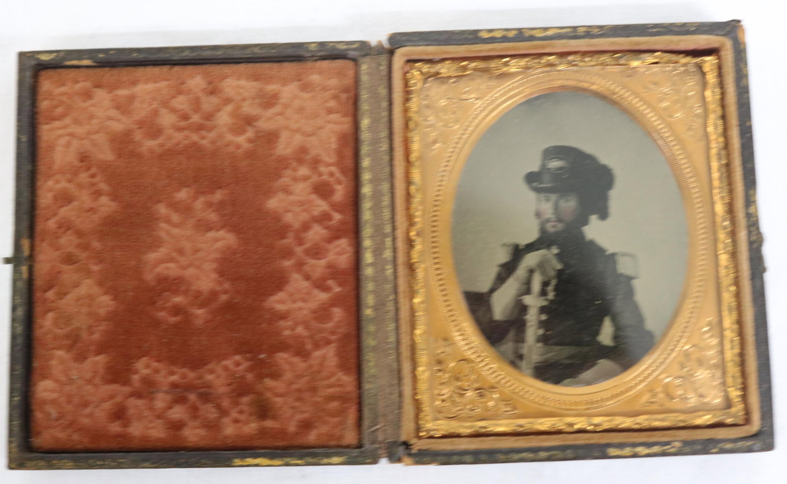 CIVIL WAR AMBROTYPE WITH OFFICER WEARING HARDEE: HAT & DRESS SWORD, ORIGINAL CASE, SHARP IMAGE, 3 1/2" X 3" CASE