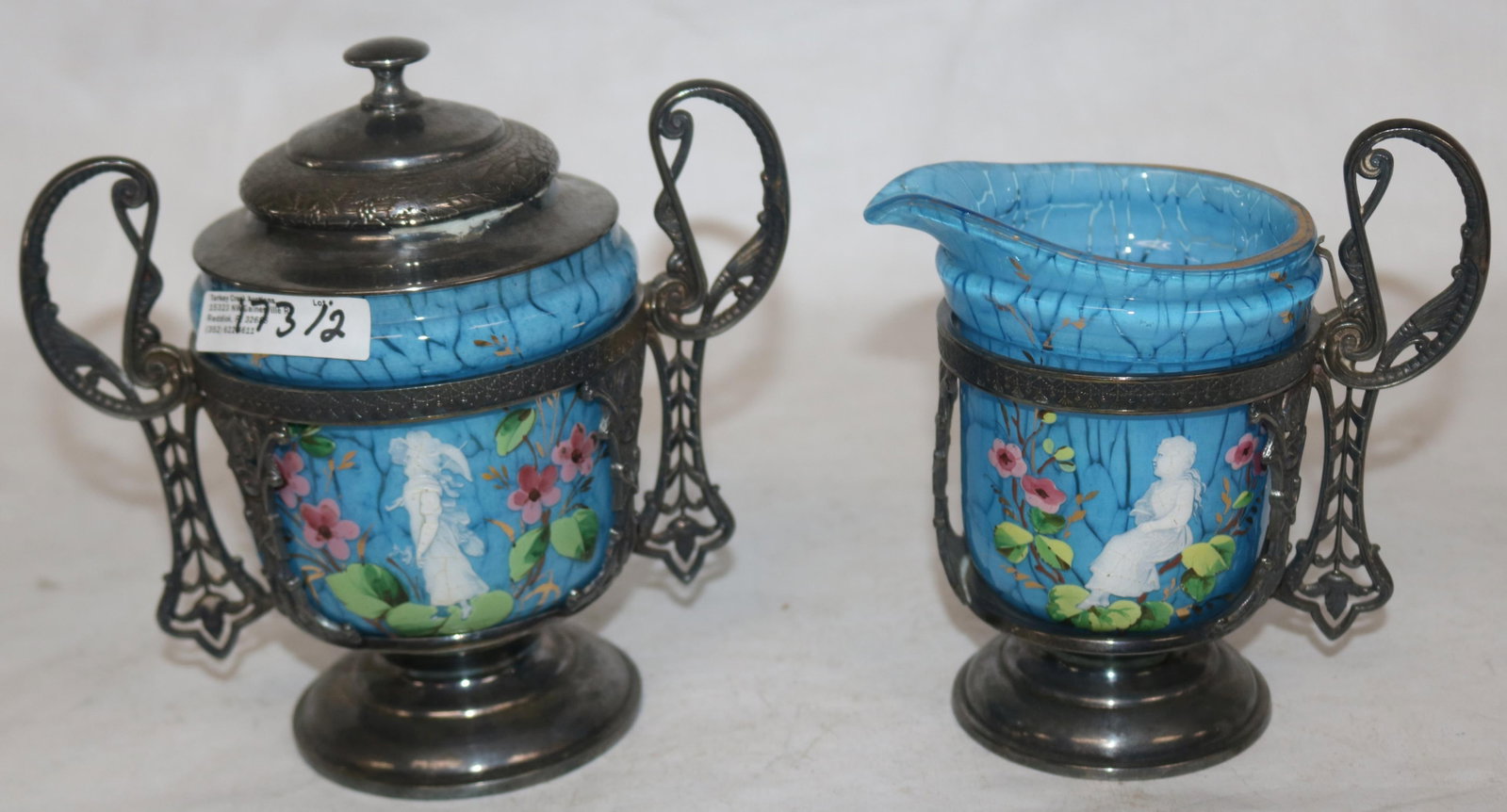 MARY GREGORY STYLE CREAM & SUGAR, ENAMELED: DECORATION, ORNATE SILVER PLATED HOLDERS, 5 1/2" - 6 1/2" H, MINOR CHIPS TO PEG IN BASE