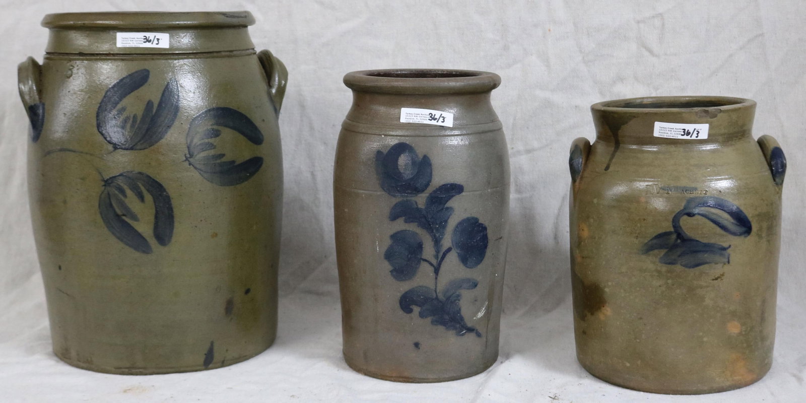 3 STONEWARE CROCKS WITH BLUE DECORATION, 12 1/2": HANDLED CROCK 3 GAL, GOOD CONDITION, 10 1/2" JAR GOOD CONDITION, 9 1/2" HANDLED CROCK J.V. MACHETT, CHIP TO RIM