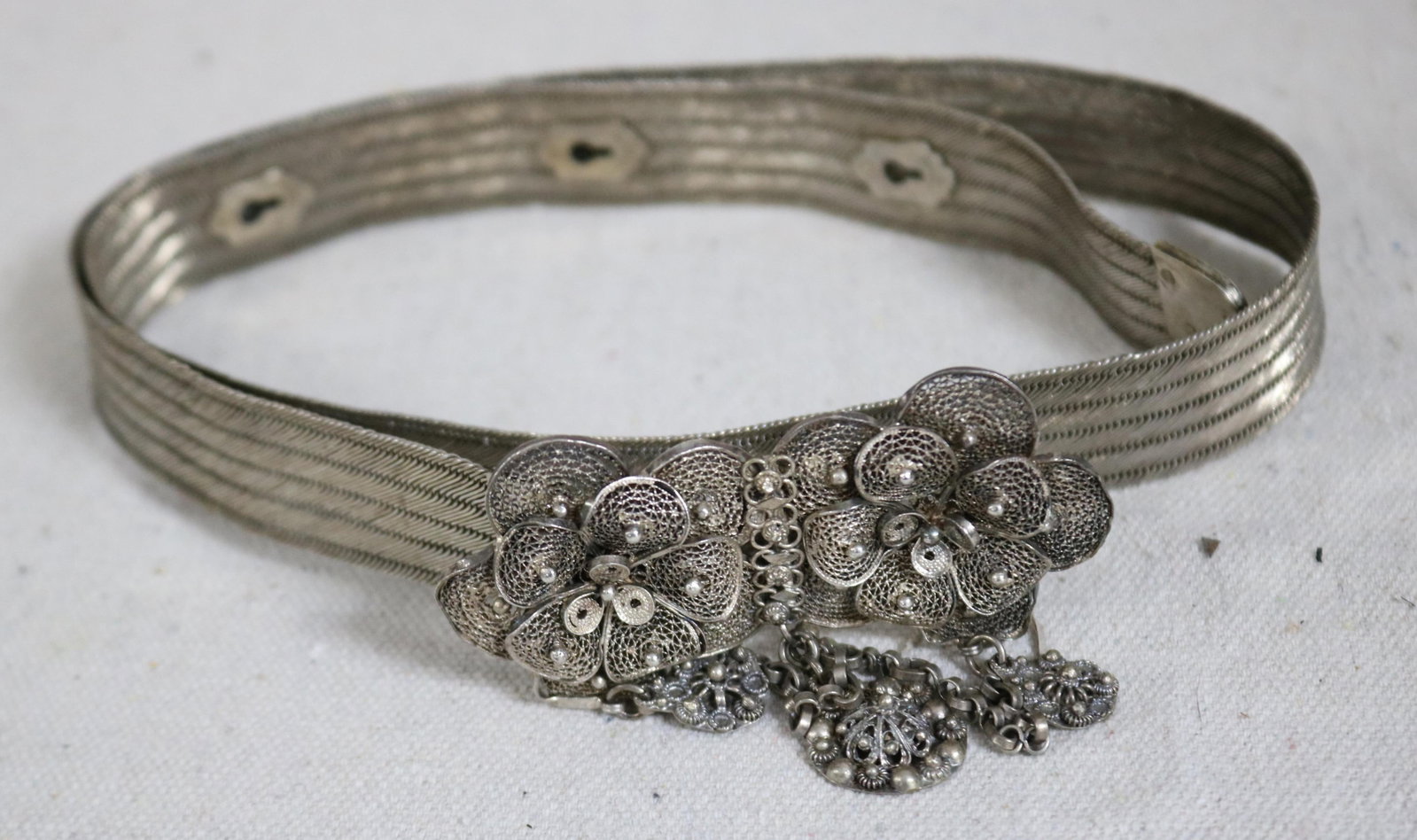 SILVER BELT WITH FLORAL DESIGN, 34" L, 7/8" W: BELT, POSSIBLY PERSIAN HALL MARKS, TESTED, 5.14 OZT