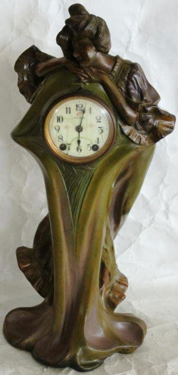 ART NOUVEAU FIGURAL SHELF CLOCK, OF WOMAN,: BY SETH THOMAS, PATINATED FINISH, 20" H, 9 1/2" W, 7 1/2" D, UNKNOWN WORKING CONDITION