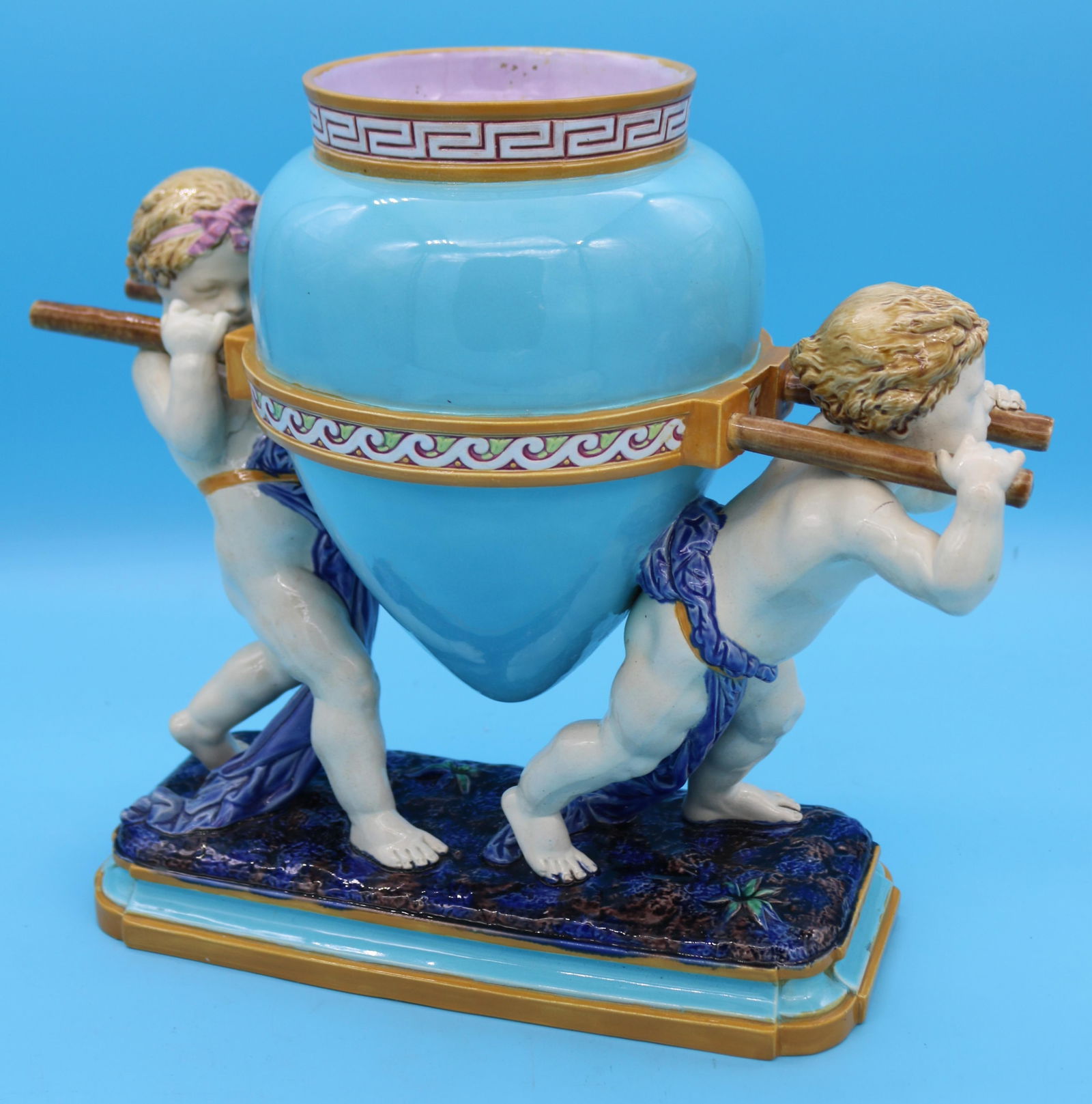 MINTON WATER CARRIER VASE, TURQUOISE WITH 2: DRAPED PUTTI FIGURES, 14" H, 15" W, 7" D, SHOWS PROFESSIONAL RESTORATION