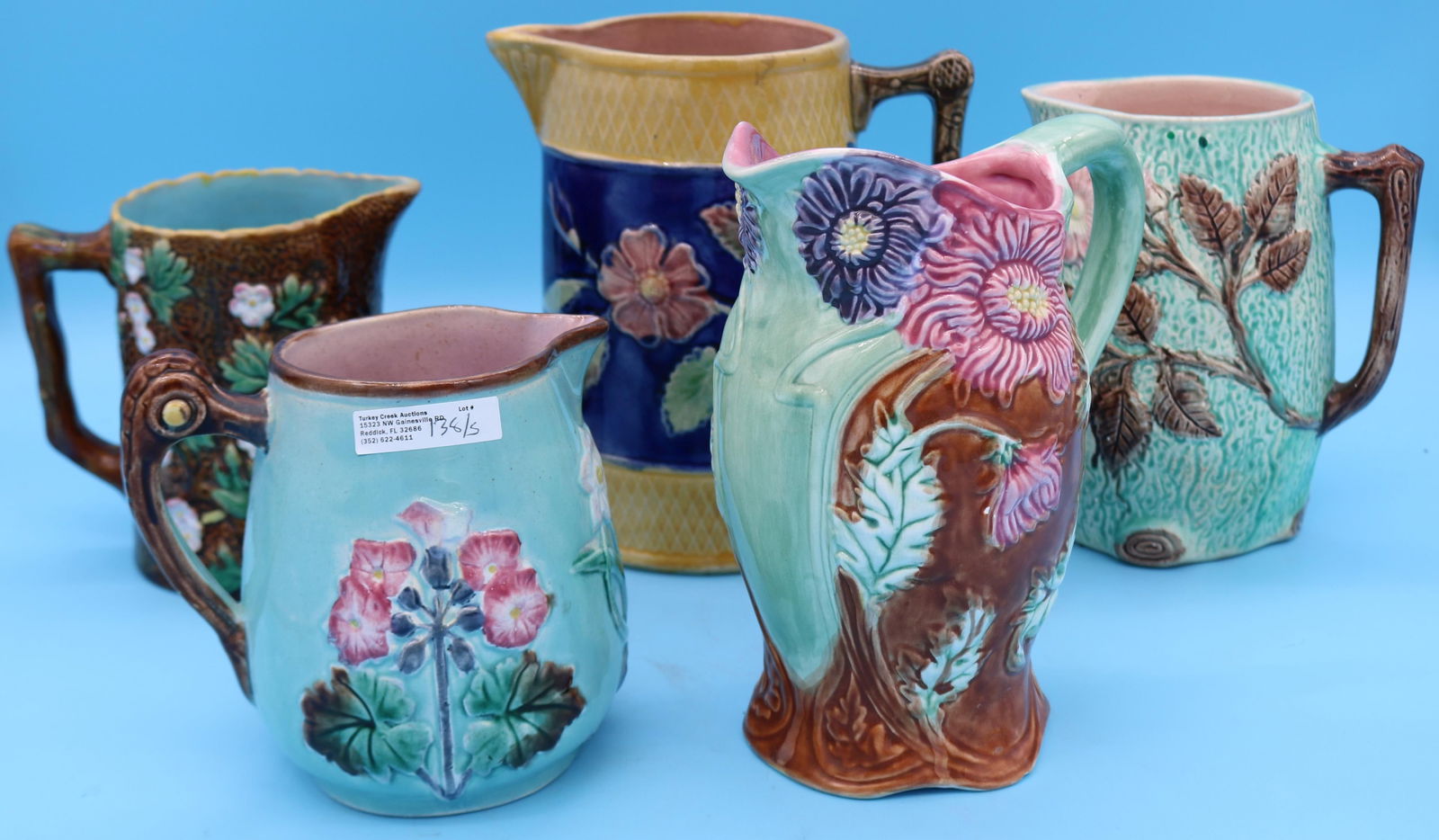 FIVE 19TH C. MAJOLICA PITCHERS, FLORAL DESIGNS, 5 (1 of 3)