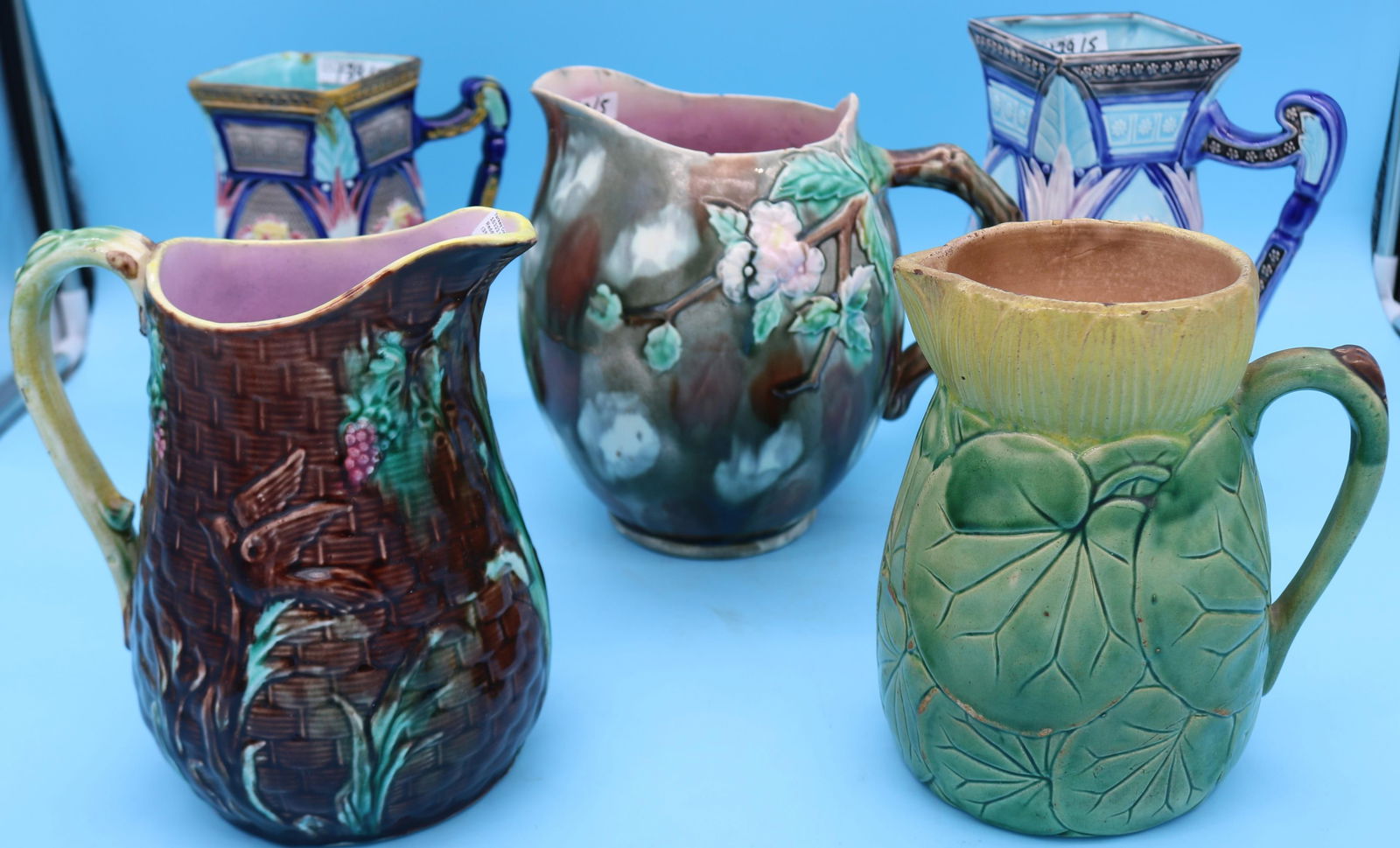 FIVE 19TH C. MAJOLICA PITCHERS, 2 SIMILAR ART (1 of 3)