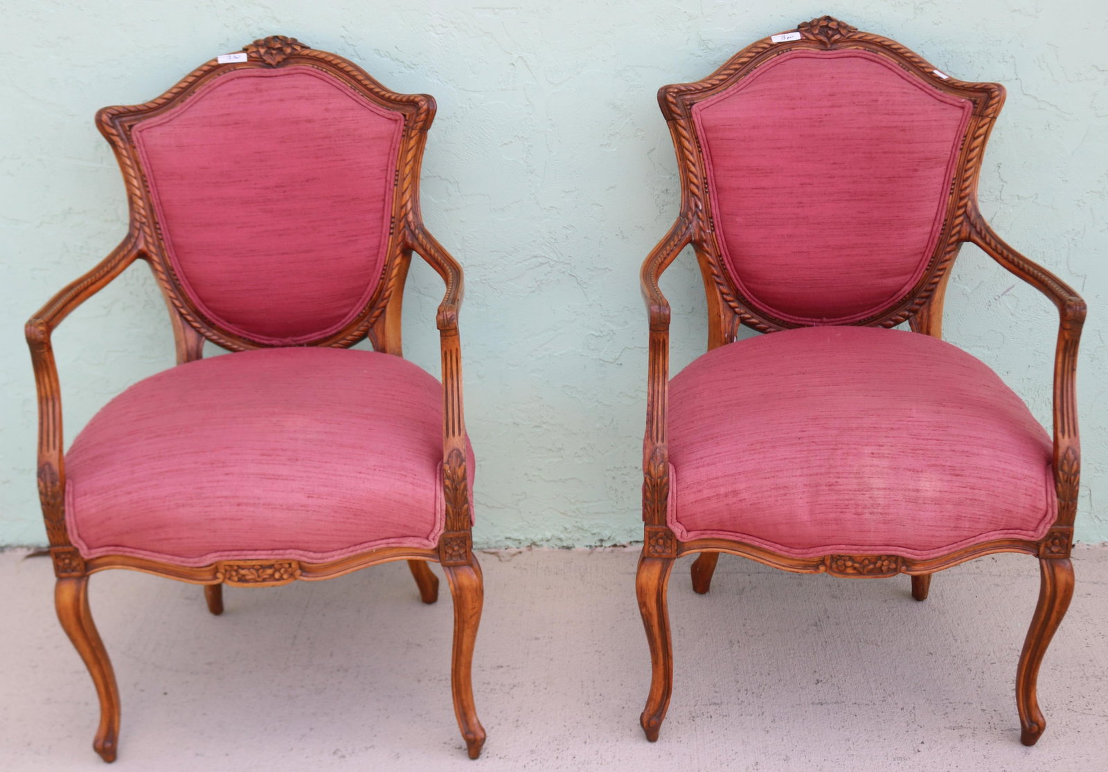 PAIR CUSTOM FRUITWOOD FRENCH PROVINCIAL STYLE ARM: CHAIRS, CARVED FRAME, UPHOLSTERED BACK & SEAT, NATURAL FINISH, 1 CHAIR SHOWS CRACK TO BACK SIDE, 37 1/2" H, 24" W, 25" D, 20" SEAT HEIGHT