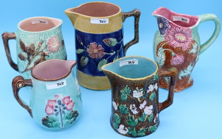 FIVE 19TH C. MAJOLICA PITCHERS, FLORAL DESIGNS, 5