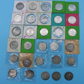 COLLECTION OF 31 WALKING LIBERTY HALF DOLLARS,