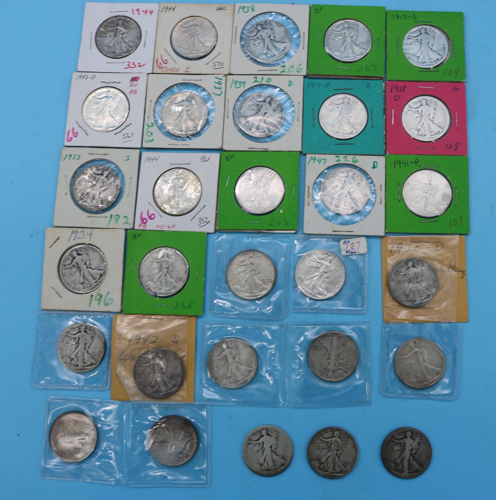 COLLECTION OF 31 WALKING LIBERTY HALF DOLLARS,: MOST IN CIRCULATED CONDITION, VARIOUS DATES