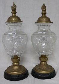 PAIR 20TH C. CUT GLASS URNS WITH BRASS TOPS,