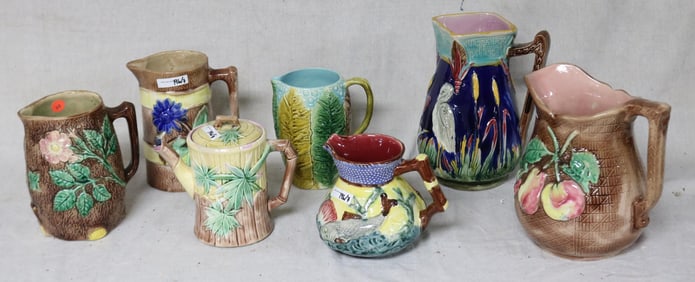 LOT SEVEN 19TH C. MAJOLICA PITCHERS & TEA POT,