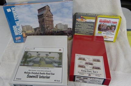 COLLECTION OF HO BUILDING KITS. ALL ARE SEALED.