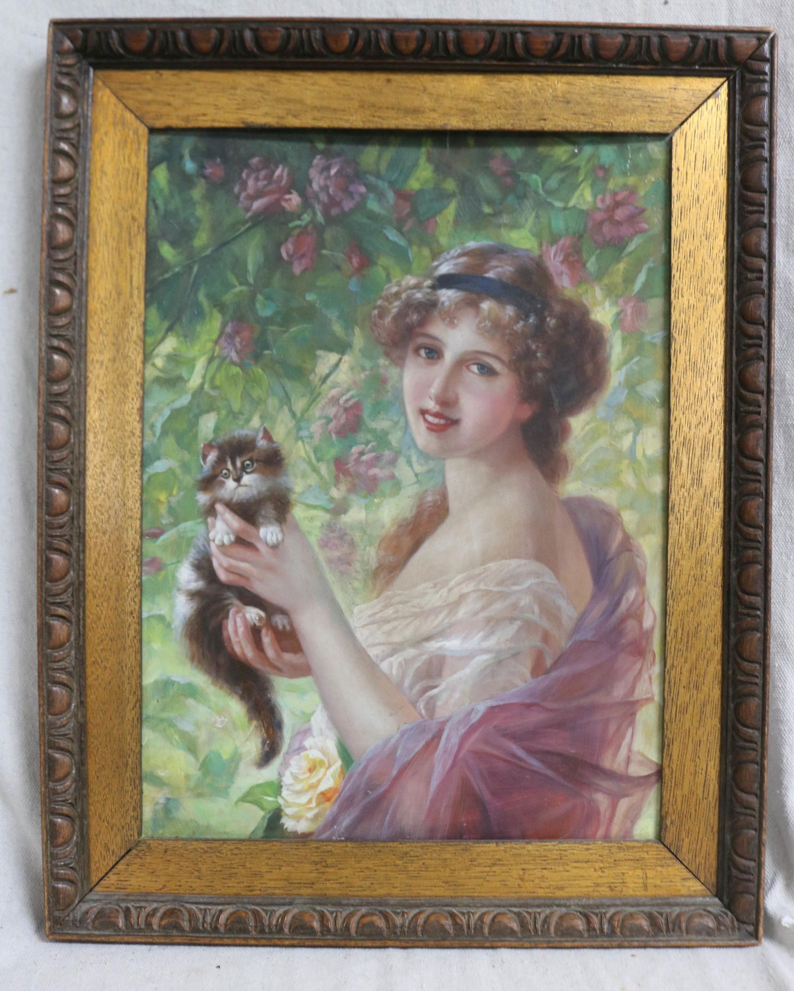 OIL ON WOOD BOARD, YOUNG WOMAN WITH KITTEN,: UNSIGNED, OAK FRAME