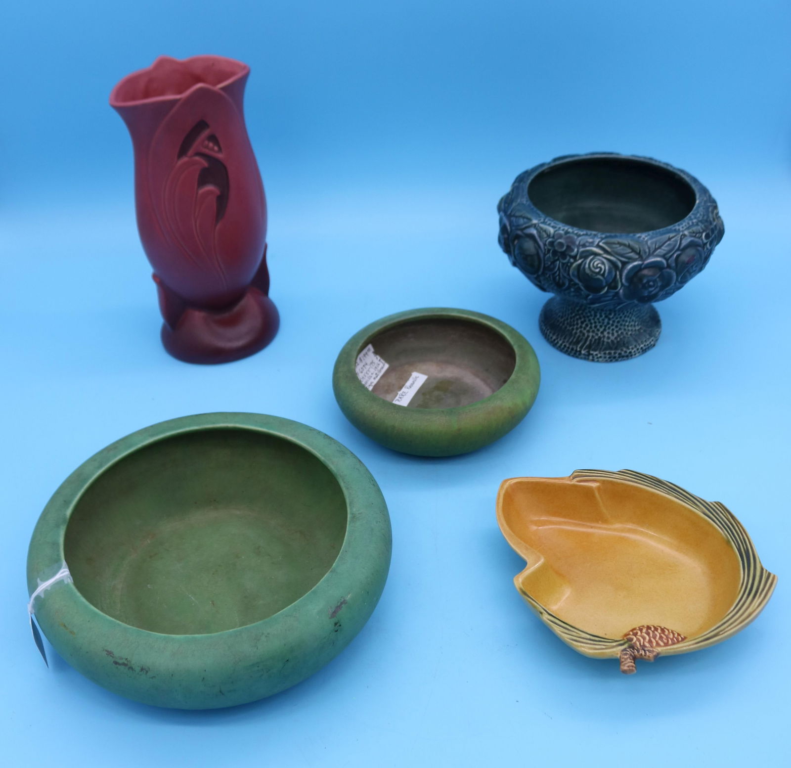 5 PCS. ROSEVILLE, 2 MATT GREEN BOWLS 2" - 3" H,: 6" - 8 3/4" DIA., ROZANE FOOTED BOWL 5 1/4" H, 6 1/2" DIA., PINE CONE TRAY 1 1/2" H, 7" W, 6" D, SILHOUETTE VASE 9 1/2" H, GOOD OVERALL CONDITION