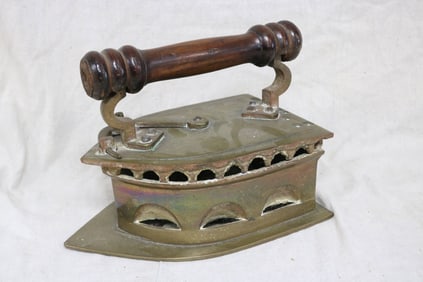 LARGE HEAVY BRASS COAL IRON WITH TURNED WOOD
