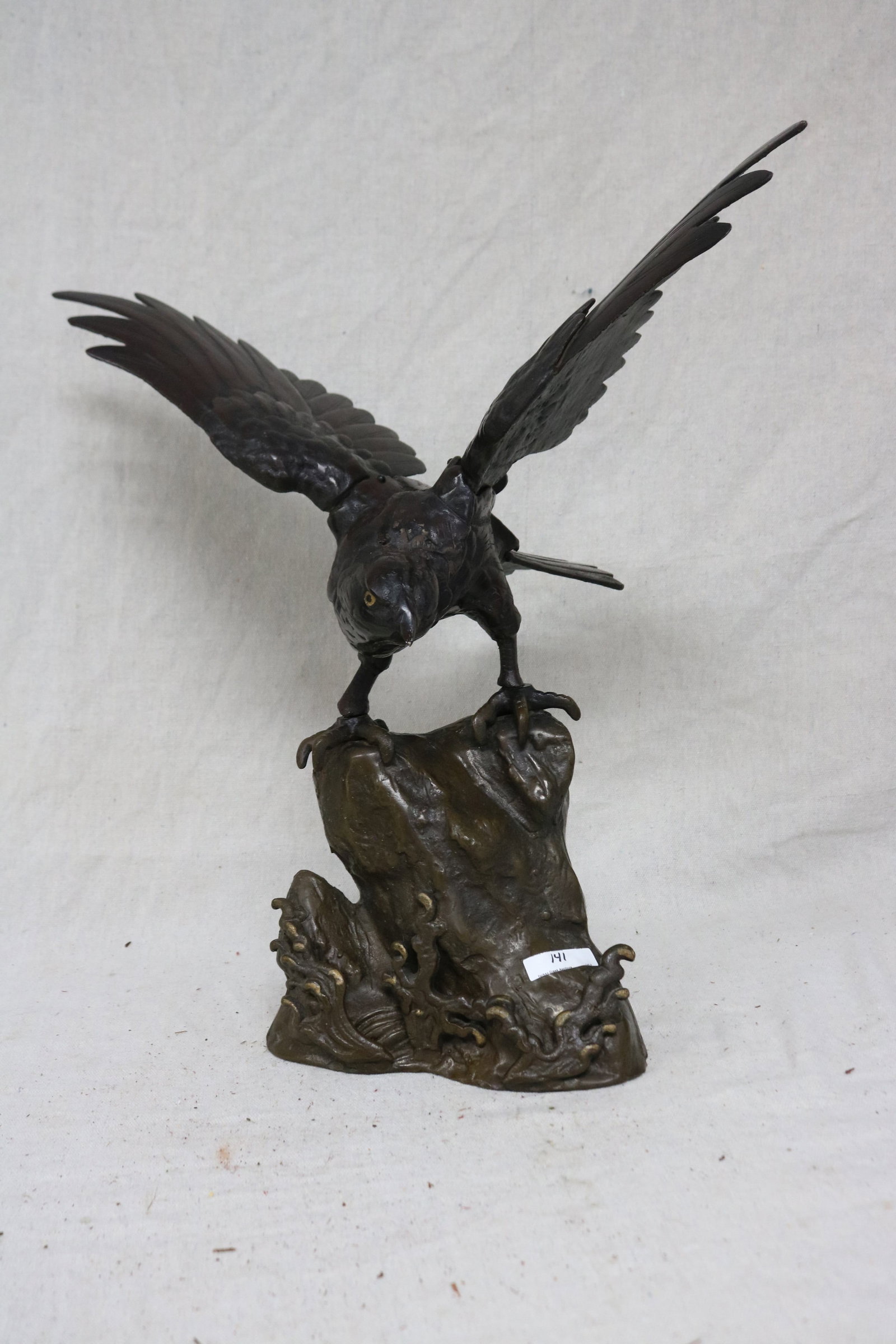 CAST IRON EAGLE WITH BRONZE FINISH, POSSIBLY: CHINESE, 20TH C. 19 1/2" H, 20" W, 12" D