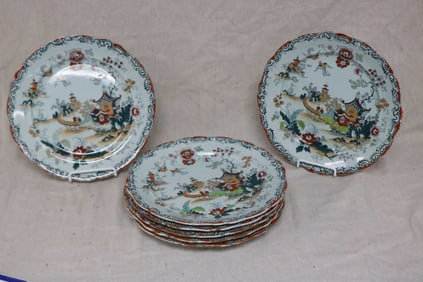 SET OF SEVEN POLYCHROME DECORATED IRONSTONE
