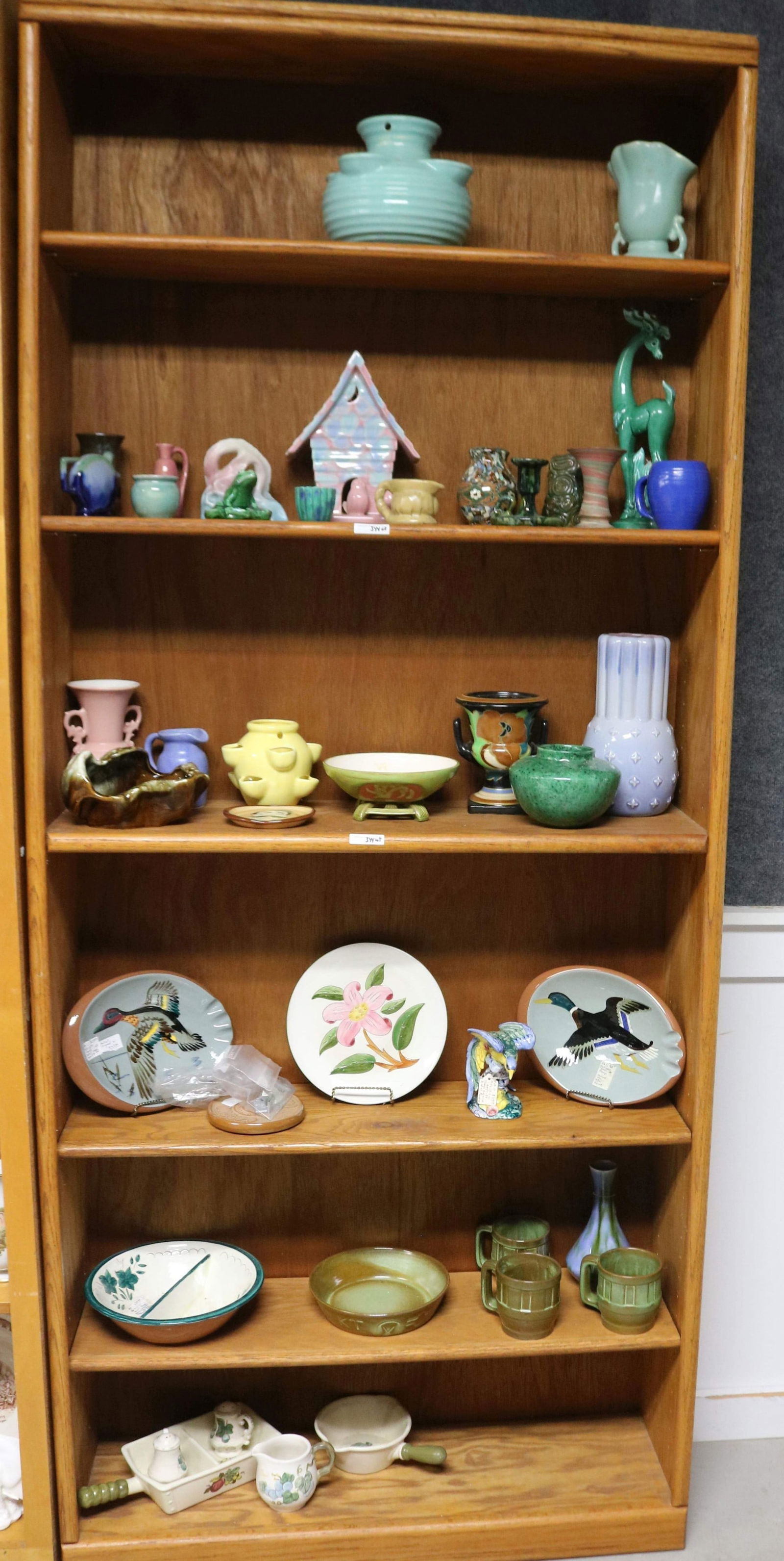 BOOKCASE LOT 6 SHELVES OF MISC. POTTERY, 42 PCS., (1 of 4)