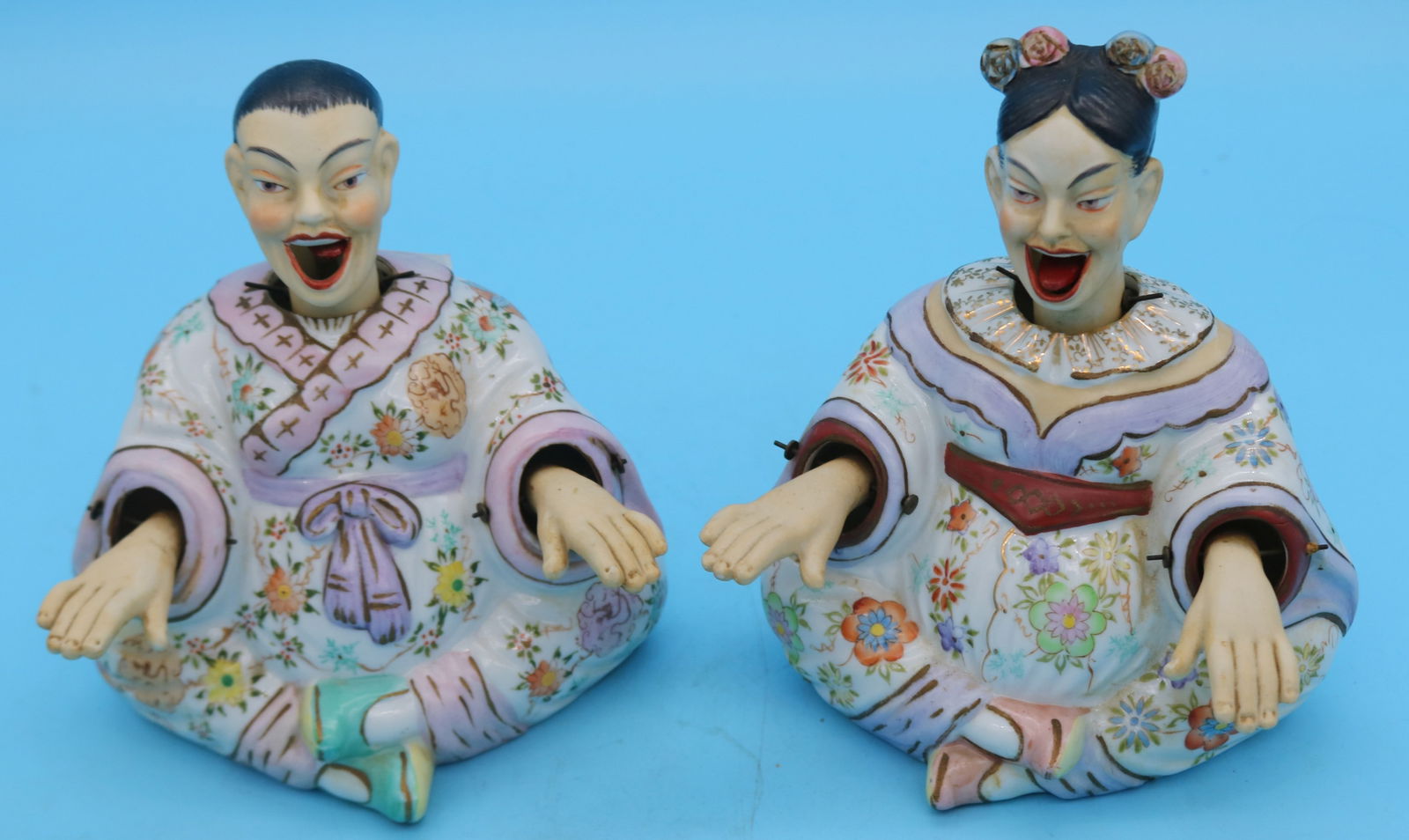 PAIR ASIAN NODDERS, POSSIBLY JAPANESE PORCELAIN,: EARLY 20TH C. NODDING HEADS, HANDS & TONGUES, NO VISIBLE DAMAGE, 6 1/2" - 6 3/4" H, 6" W
