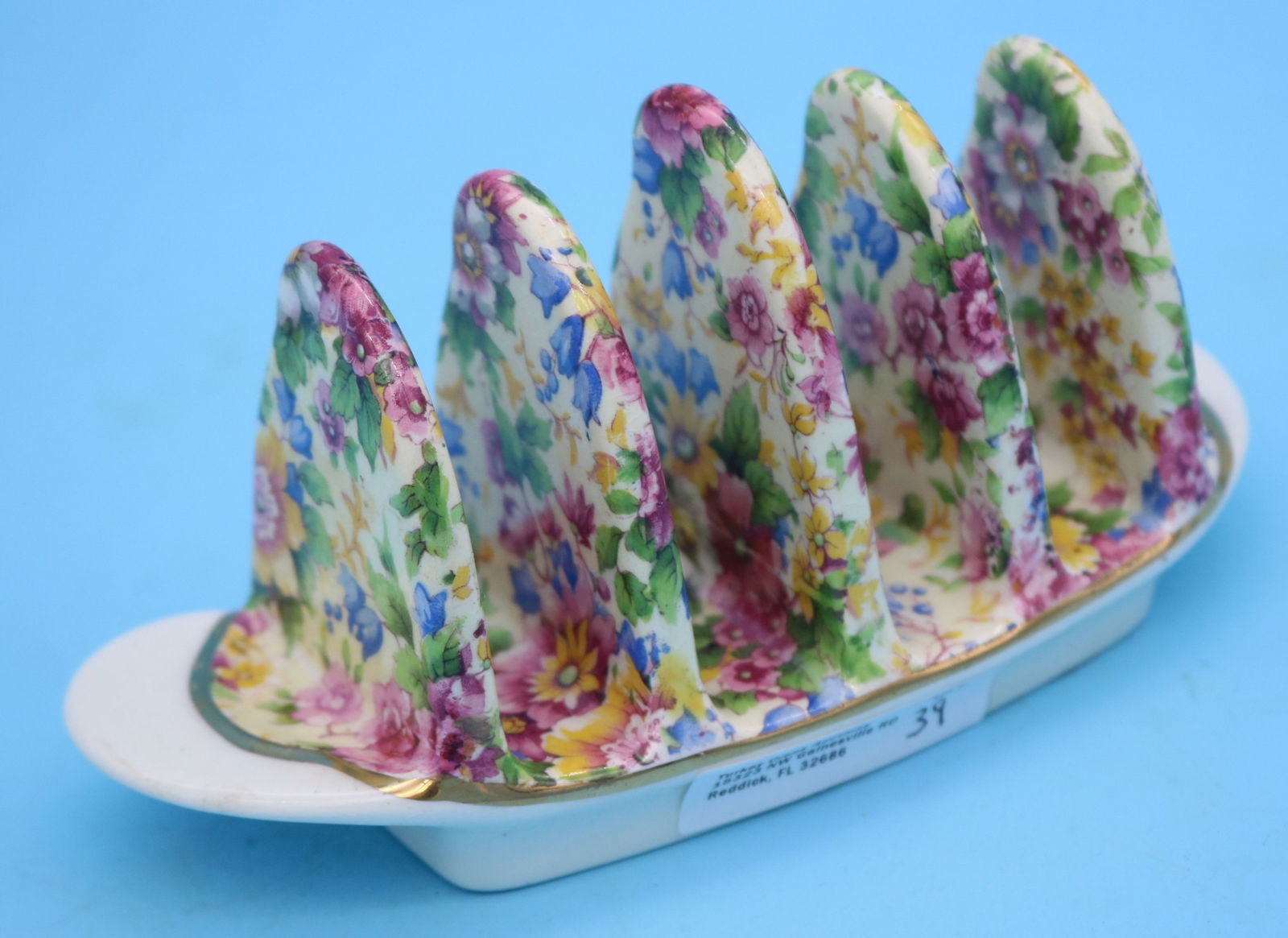 ROYAL WINTON CHINTZ TOAST RACK "SUMMERTIME": PATTERN, HOLDS 4 SLICES, 3 1/4" H, 6 1/4" W, 2 1/2" D