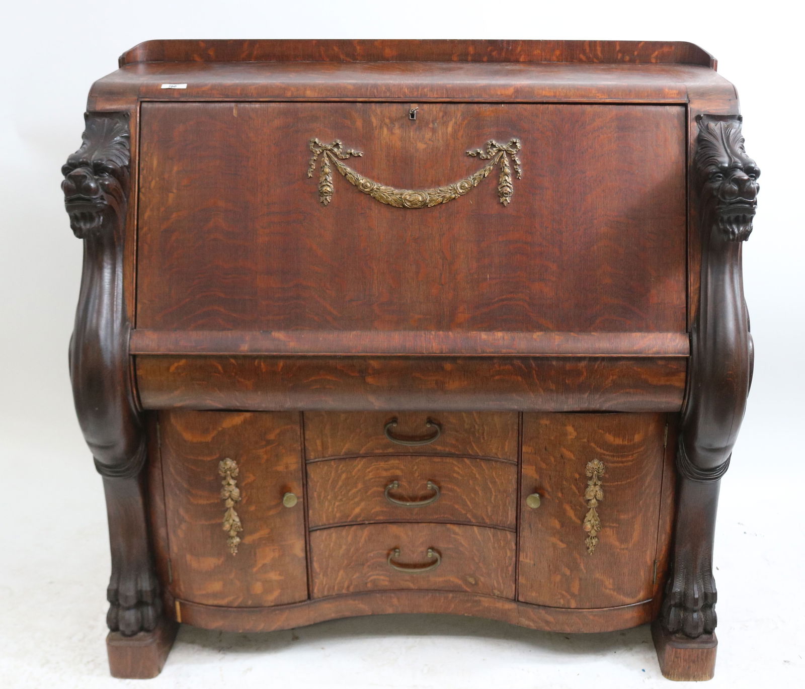 EXCEPTIONAL GRIFFIN CARVED OAK SLANT LID DESK, (1 of 5)