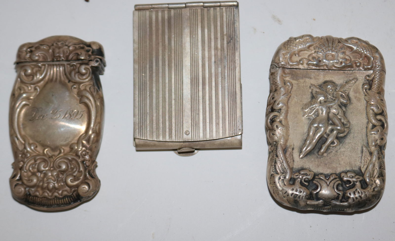 3 STERLING MATCH HOLDERS, 2 FANCY VICTORIAN & ART: DECO BY NAPIER, MONOGRAMMED VICTORIAN HOLDER HAS SEPARATION, 2 3/8" - 2 3/4" H, 1 1/2" - 1 3/4" W