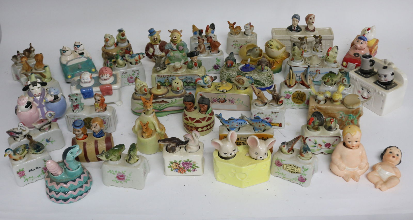 APPROX. 40 NOVELTY NODDING SALT & PEPPER SHAKERS,: 1 1/2" - 4 1/2" H, MOSTLY JAPANESE, 2 1/4" - 6 1/4" W, GOOD CONDITION, NEEDS CLEANING