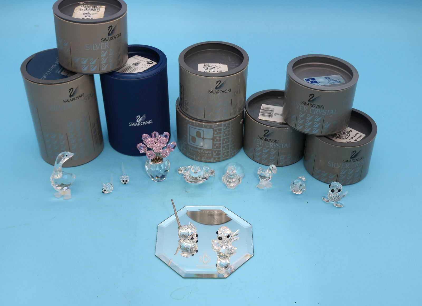 11 SWAROVSKI CRYSTAL FIGURES, 8 WITH ORIGINAL: CONTAINERS, MICE 2 OF 3 SMALL SIZE, BIRDS, POTTED PLANT, SEALS 1 WITH MISSING TAIL, FROG, GEESE, 1" - 2 1/2" H, 1/2" - 2" W