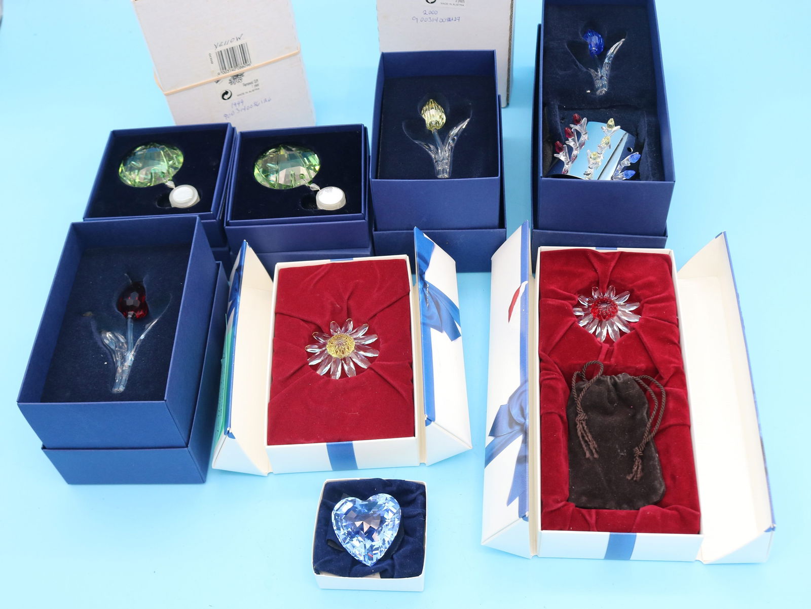 LOT 8 SWAROVSKI CYSTAL ITEMS, FLOWERS, EHART,: ETC. ALL IN ORIGINAL BOXES, 2" - 3 1/2" H