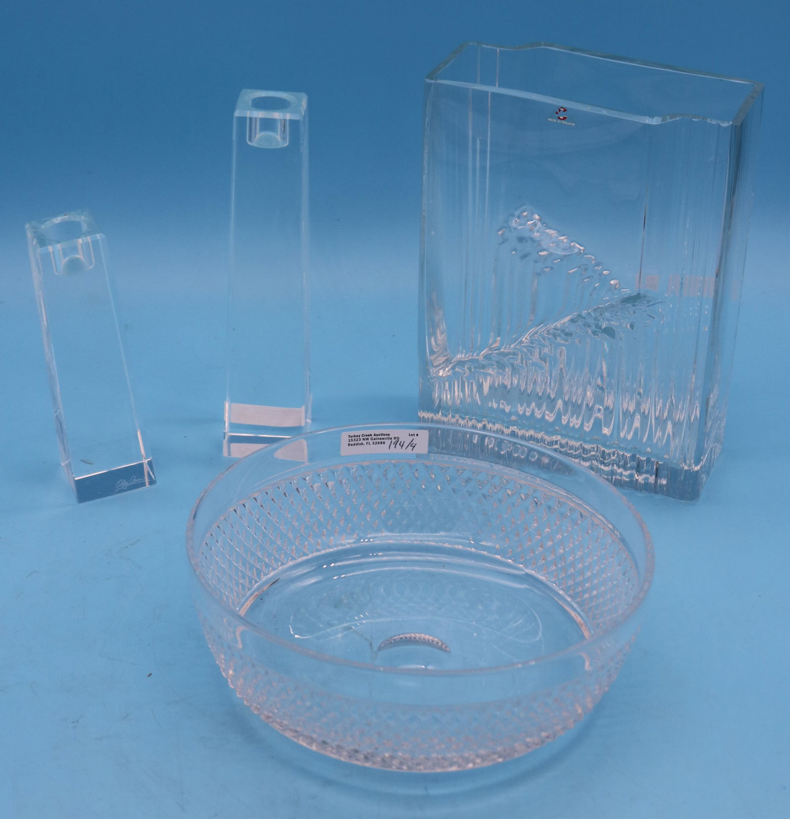 4 PCS. QUALITY CRYSTAL GLASSWARE, TIFFANY BOWL 3": H, 8 1/4" DIA., FINISH GLASS VASE 8 3/4" H, 6 1/2" W, 2 OLLEY CASSINI CANDLE STICKS, 6" - 8" H, GOOD CONDITION