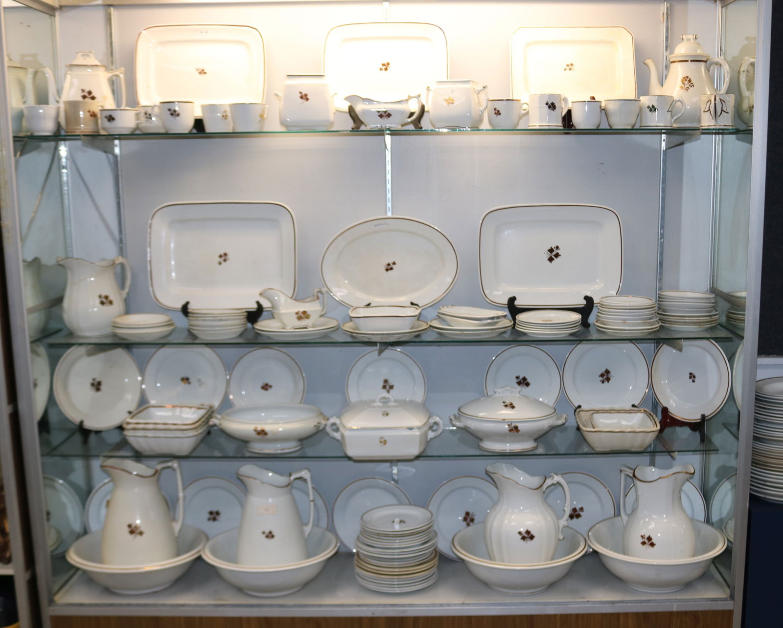 APPROX. 130 PCS. TEA LEAF LUSTRE, INCLUDING: PLATES, TUREENS, MUGS, PITCHER & BOWL SETS, PLATTERS, GRAVY BOAT, ETC.