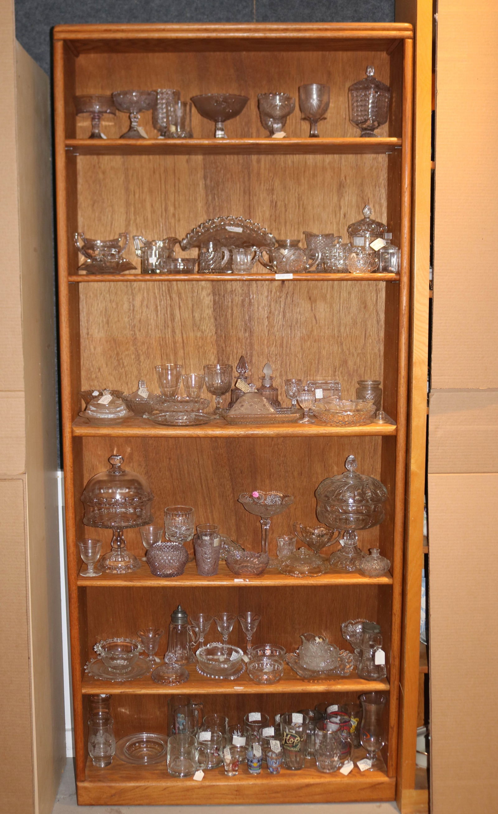 LARGE LOT OF 99 PCS. CLEAR GLASS, GOBLET,: COMPOTES, BOTTLES, COVERED JARS, CANDLEWICK, ETC.